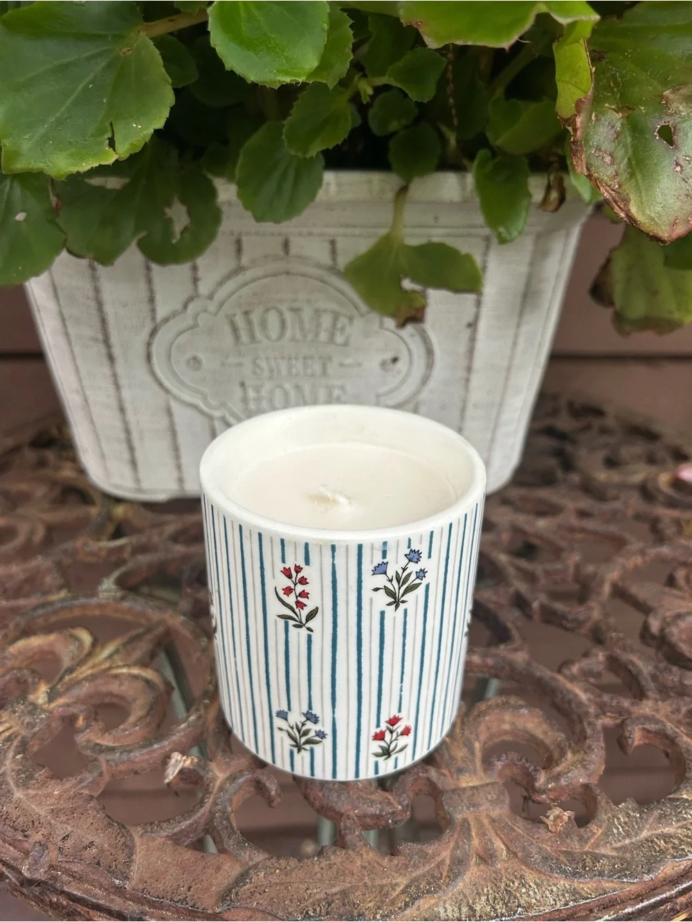 Anthropologie White Ceramic Candle with Blue Stripes and Red Floral Accents